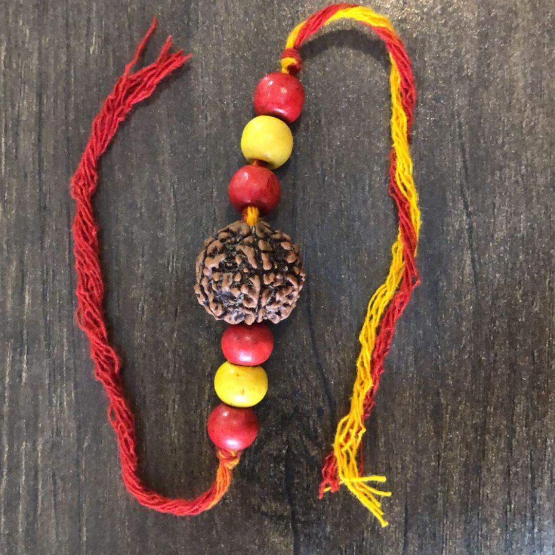 Yellow Red Rudraksh Wooden Rakhi