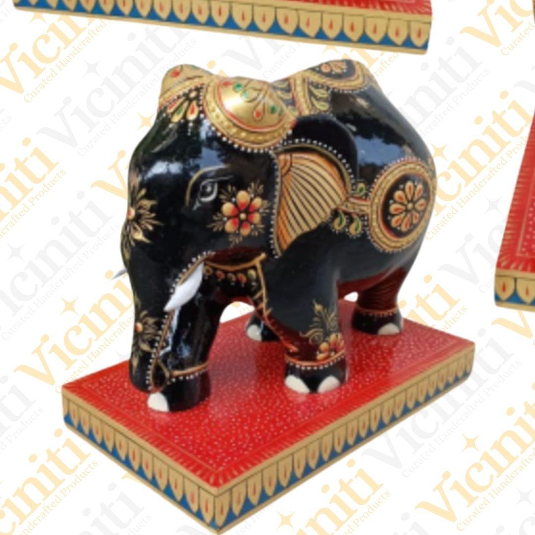 Gold Fine Work Black trunk wooden elephant handcrafted showpiece with base